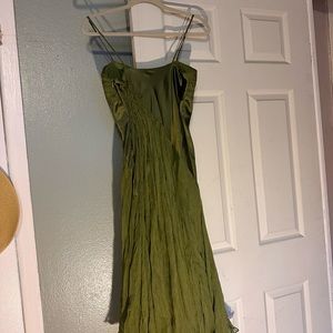 a beautiful dress for a special occasion. Silk, green olive. Worn but still cute